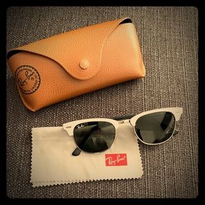 Ray-Ban Clubmasters in White with black lenses.